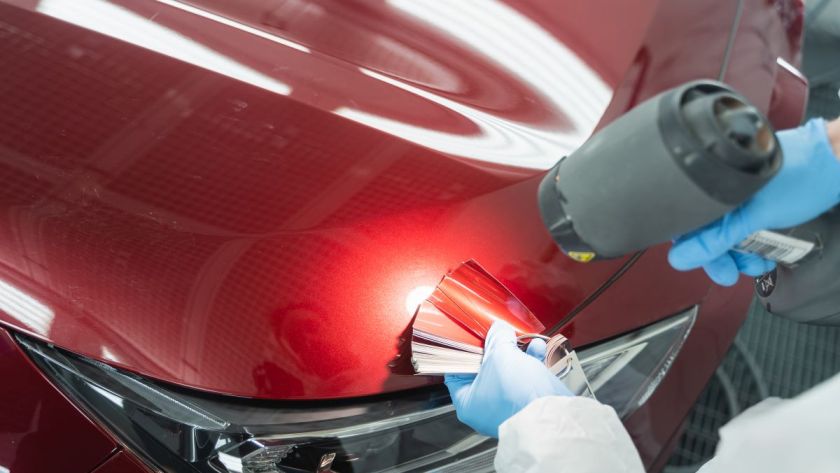 close-up-view-of-the-hands-of-auto-painter