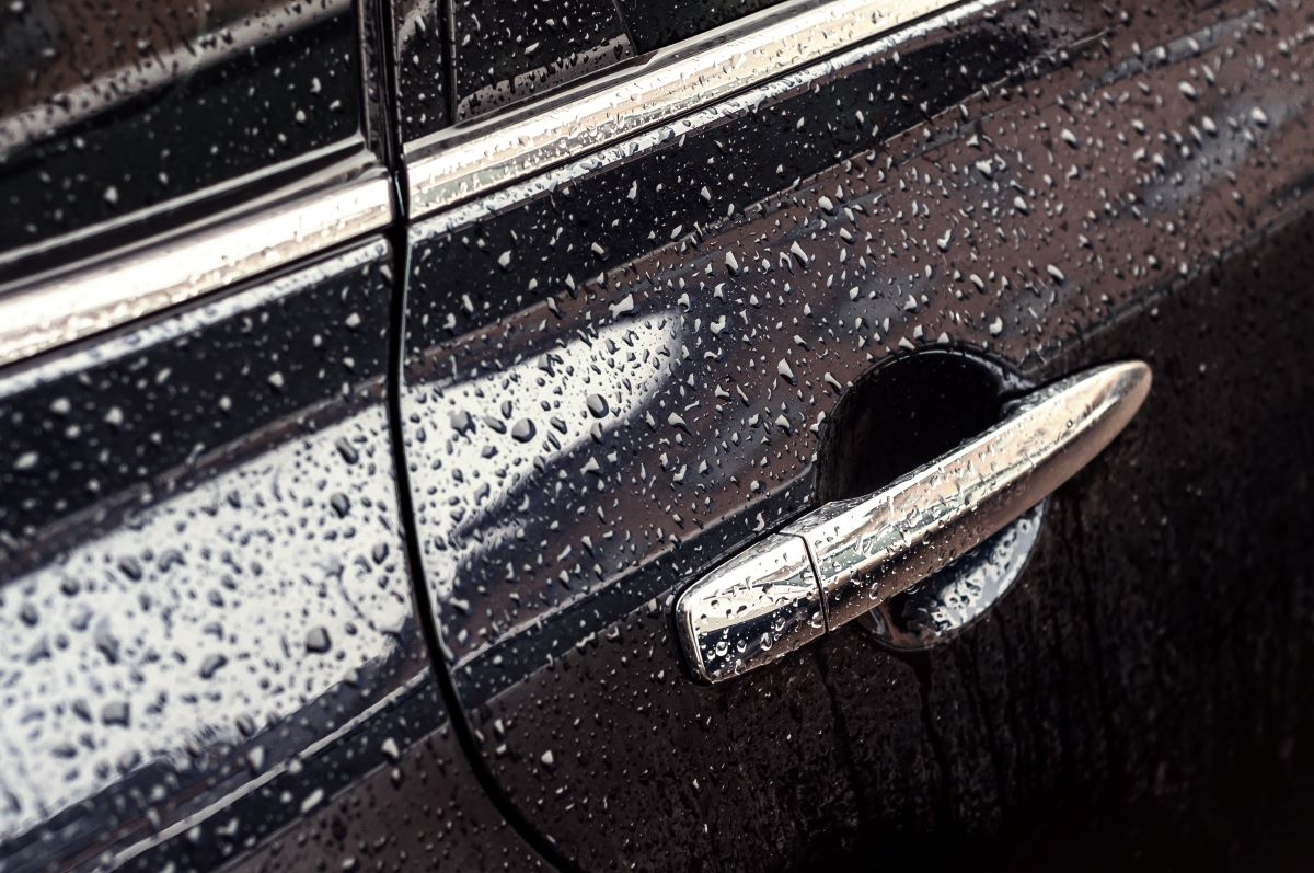Water spots and mineral deposits on vehicle paint